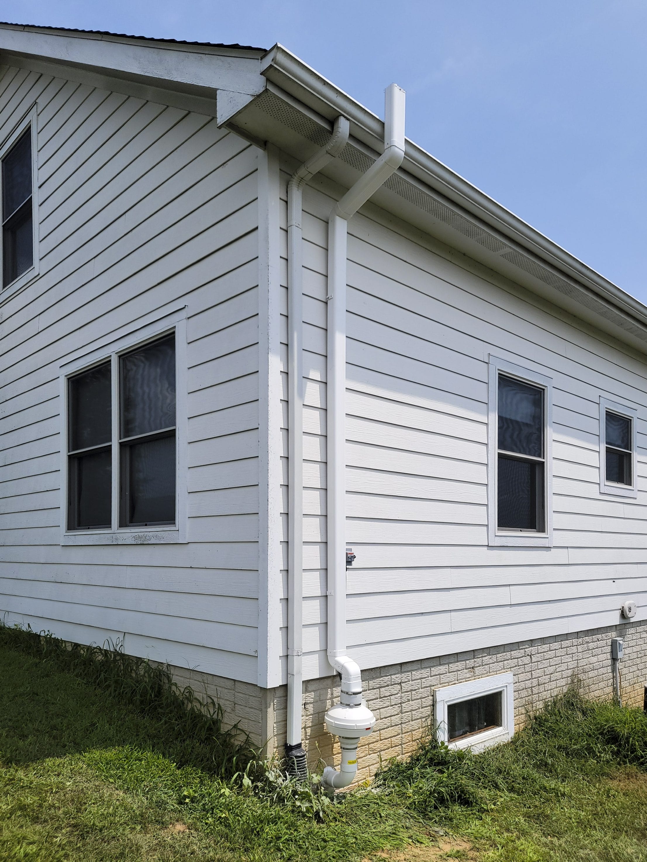 Radon services on house exterior
