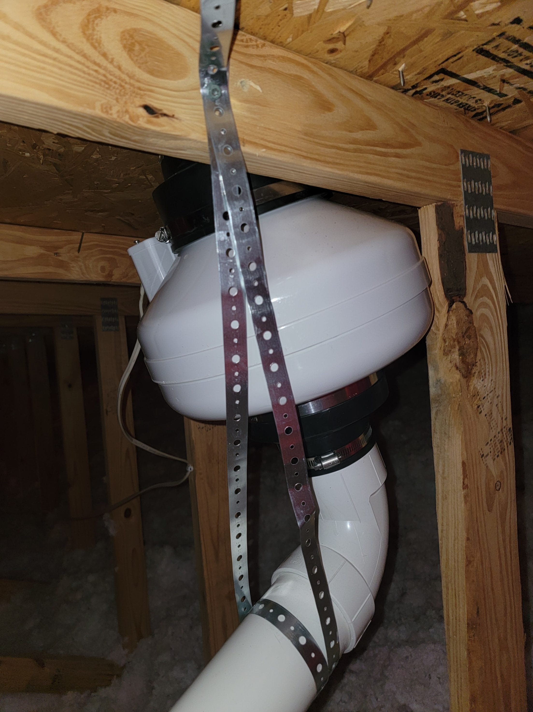 Radon system fan repair in attic
